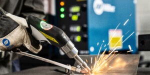 Miller Electric, Miller Electric Manufacturing, Dave Lambert, OptX™ 2kW handheld laser welder, IPG Photonics Corporation, welding shops, welding, laser welder, precision welding, fabrication, TIG